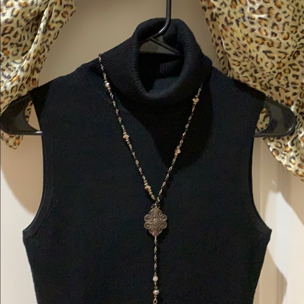 Allison Brittney black open shoulder turtle neck